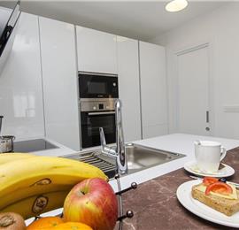 5 bedroom beachfront villa with heated pool near Omis, sleeps 9